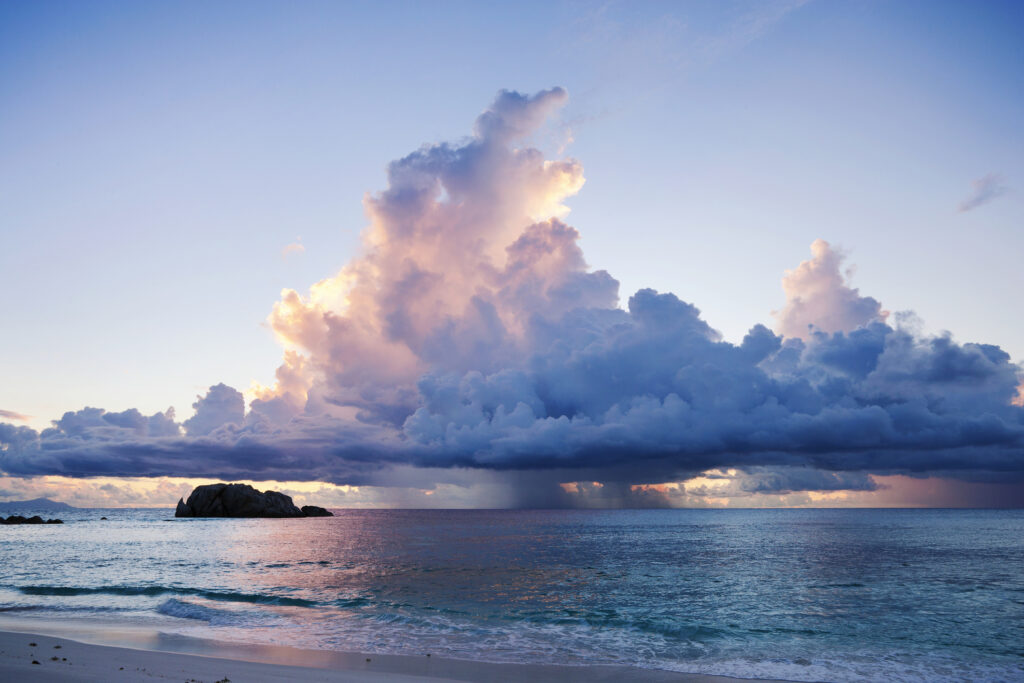 Storm clouds at sunset over the ocean. Seychelles.